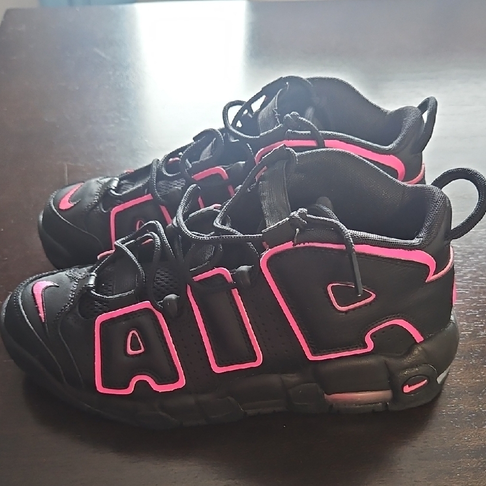 Nike Pink and Black High-Top Sneakers with Bold Design